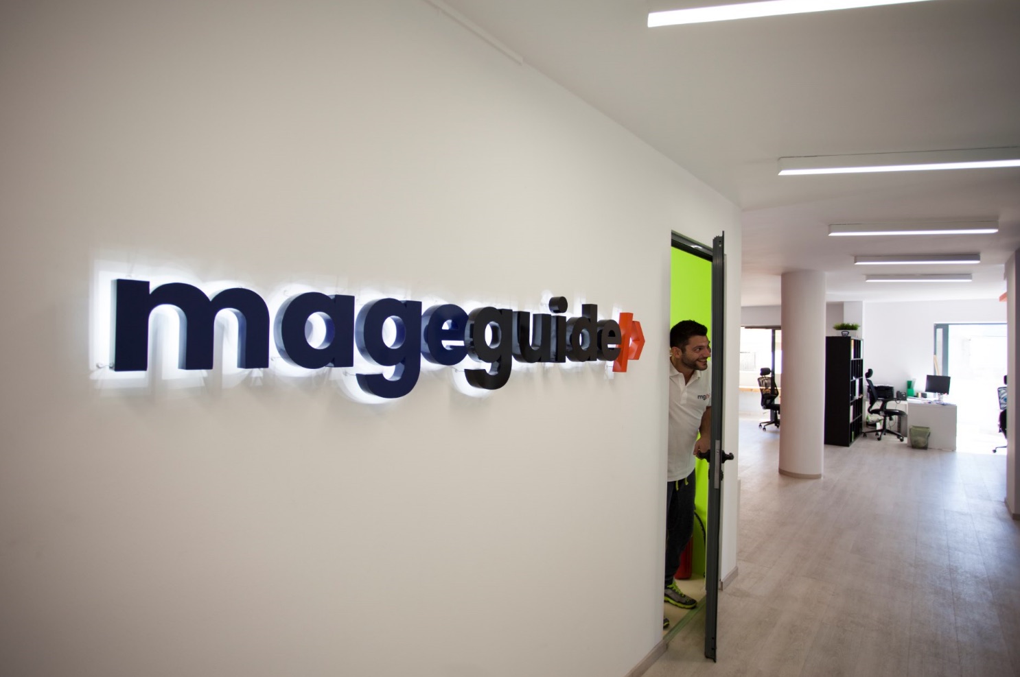 The Mageguide logo at the office entrance